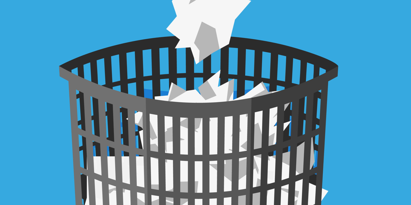 Trash Can with Crumpled Paper Inside and Around.